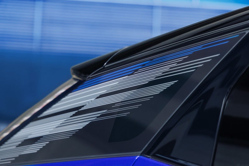 Close-up of the Modern Pattern on the 2026 OPTIQ-V Rear Quarter Glass | McDonald Cadillac in Saginaw MI